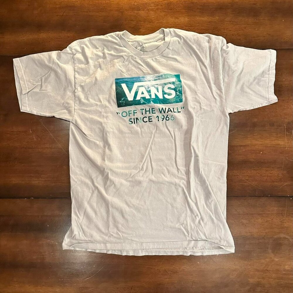 Light gray Vans tee with bluegreen waves logo